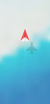 Top view of red origami paper airplane with realistic shadow on bokeh beach background. photo
