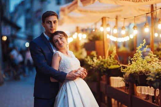 wedding couple at night lighting. Cafe along with decoration lig photo