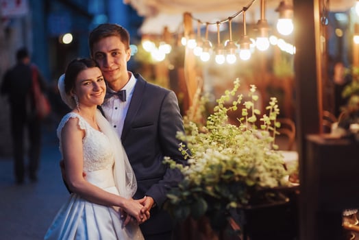 wedding couple at night lighting. Cafe along with decoration lig photo