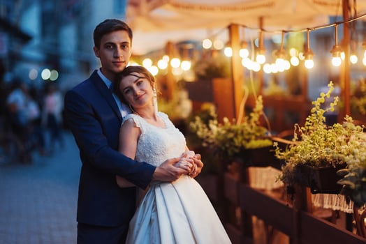 wedding couple at night lighting. Cafe along with decoration lig photo