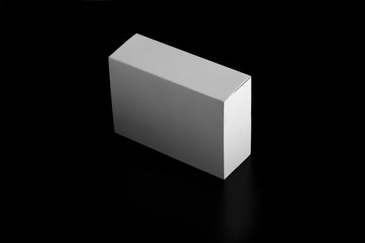 whitebox. carton moving box. white Cardboard box isolated on black photo