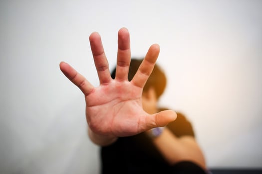 Man showing stop gesture photo