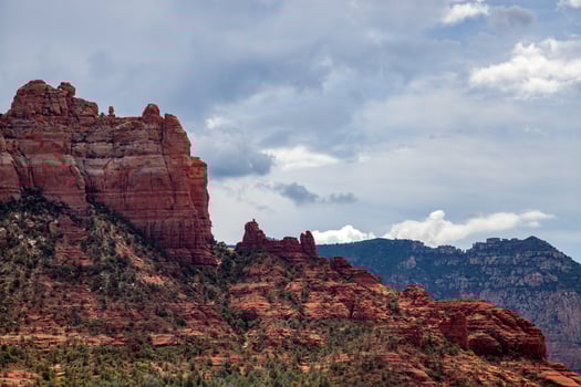 Stormy weather and bright sunshine over mountains surrounding Sedona photo