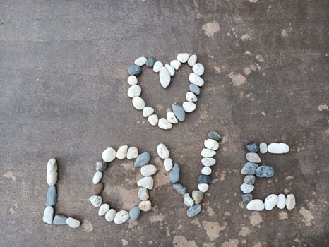 Love Heart Shaped Stone on Valentine's Day on background photo