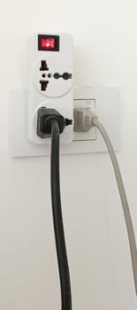 Multiple socket outlets, electrical equipment, wires and power strips in your home save electricity. photo