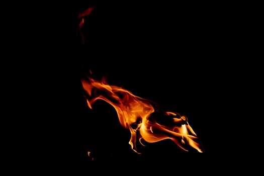 Fire flame texture. Burning material backdrop. Burn effect pattern. Blaze and torch wallpaper. Heat and haze backdrop. photo