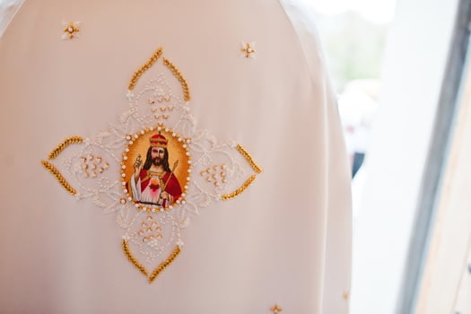 Clothing priest with Jesus Christ on back photo