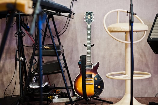 Set of musical instruments. Guitar and drums photo