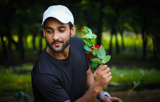 want to propose man with beautiful red rose in thinking photo