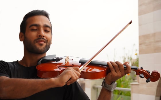 musician playing violin. Music and musical tone concept. photo