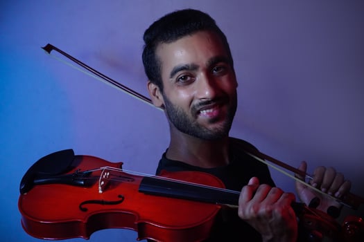 musician playing violin. Music and musical tone concept. photo