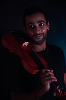 musician playing violin. Music and musical tone concept. photo