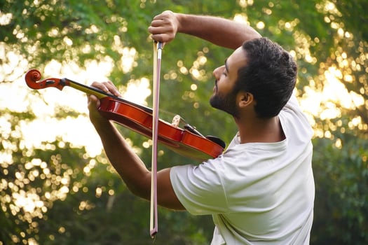 musician playing violin. Music and musical tone concept. photo