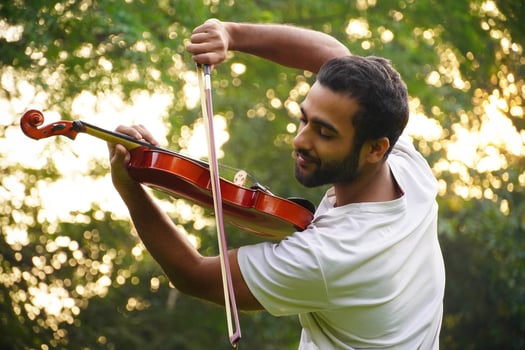 musician playing violin. Music and musical tone concept. photo