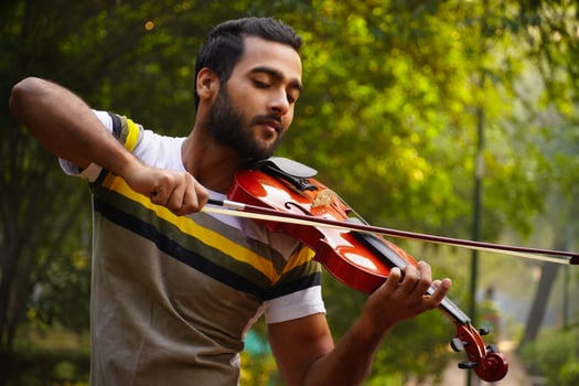 musician playing violin. Music and musical tone concept. photo
