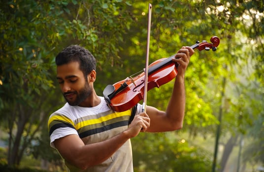 musician playing violin. Music and musical tone concept. photo