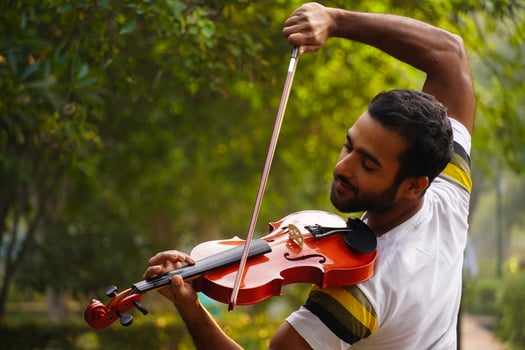 musician playing violin. Music and musical tone concept. photo