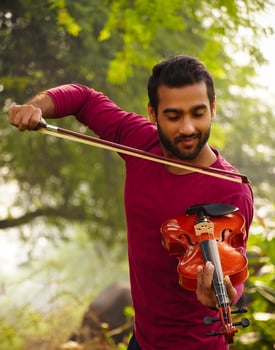 violin player images Music and musical tone concept. images of man musician photo