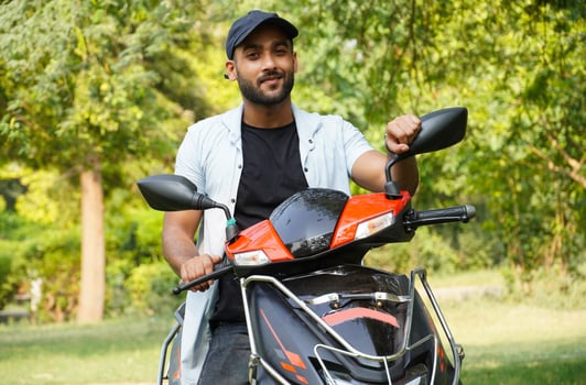 a man with his new scooter photo