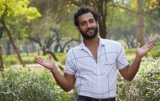 a man happy and showing hands hapy expression photo