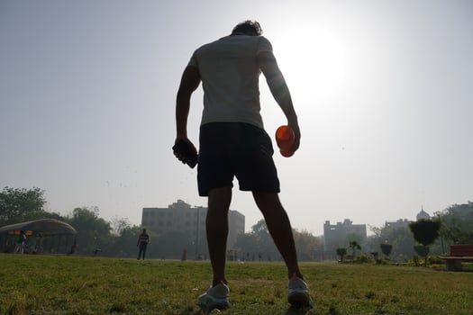 man at stedium over the silhouette image with shaker bottle for gym and drinking gainer -physical fitness concept photo
