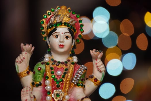 laxmi devi cute statue in diwali night photo