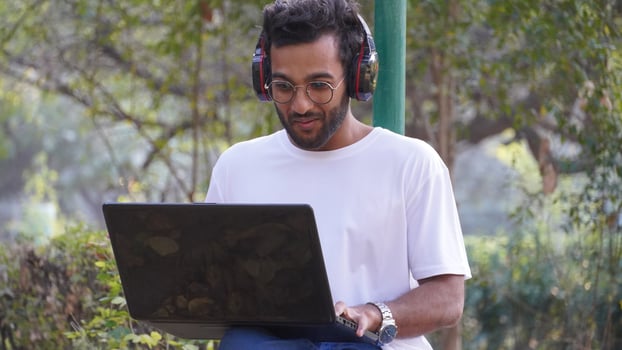 Young Student with laptop - man with laptop images photo