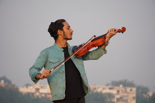musician playing violin. Music and musical tone concept. images of man musician photo