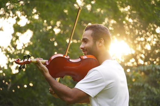 musician playing violin. Music and musical tone concept. photo