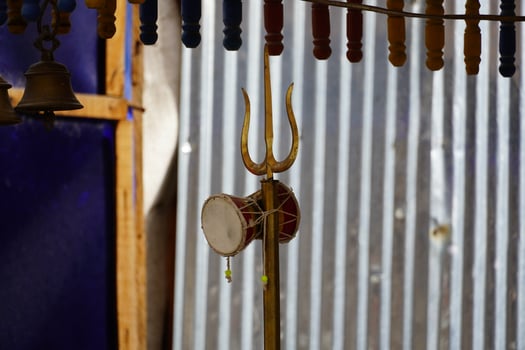 Close view of shiva's trishul and damroo hindu god shiva symbol photo