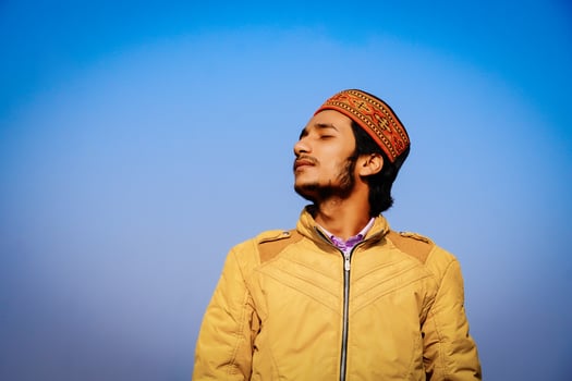portrait of a young boy from himachal pradesh, India with traditional himachali cap photo