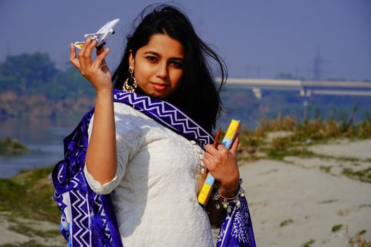 Happy smiling student girl with at outdoor shoot photo