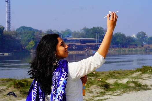 Happy smiling student girl with at outdoor shoot photo