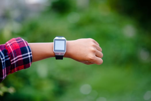 Hands and digital watches of boys Watch the time in the wrist. The orientation is punctual. photo