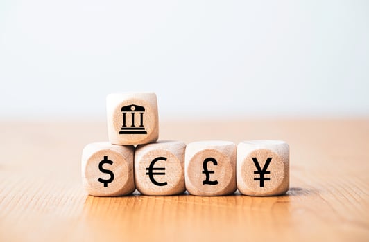 Central banking icon with main currency exchange include dollar euro yen yuan and pound sterling for forex and money transfer concept. photo