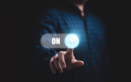 Businessman touching to virtual toggle switch for change off to on with dark background. photo