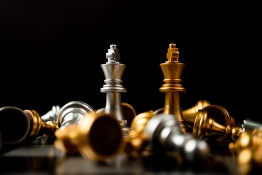 Golden and Silver King chess is last standing in the chess board, Concept of successful business leadership, Confrontation and loss photo