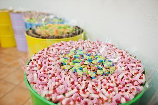 Barrels with sweets in candy shop. photo