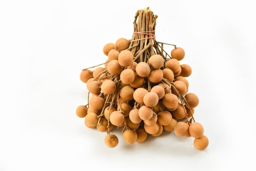 Longan isolated on white background - Bunch of fresh longan tropical fruit in Thailand or Dimocarpus longan exotic fruits photo