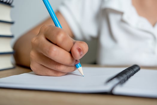 Hand and pencil pictures of students writing Education concept With copy space photo