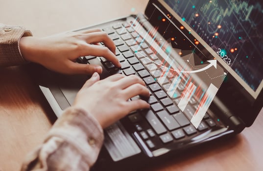 Businessman planning business growth, finance and stock markets add positive indicators for 2023 to boost business growth. photo