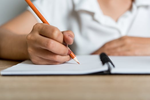 Hand and pencil pictures of students writing Education concept With copy space photo