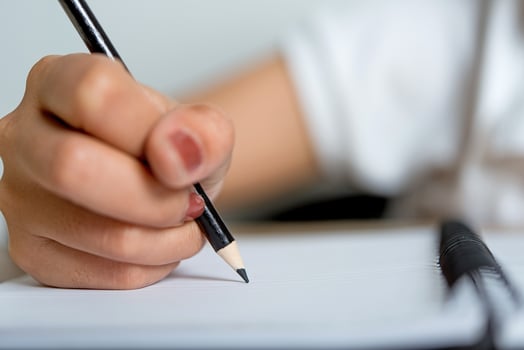 Hand and pencil pictures of students writing Education concept With copy space photo