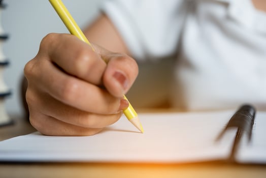 Hand and pencil pictures of students writing Education concept With copy space photo