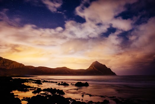 Night landscape with stars and cumulus clouds photo