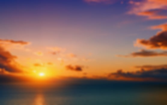 Red sunset over the sea, rays of light.Natural blurred backgroun photo