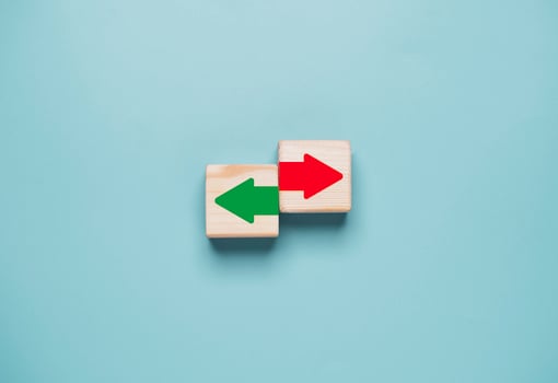 Red arrow move right direction and green move to left side for different thinking idea and direction concept. photo