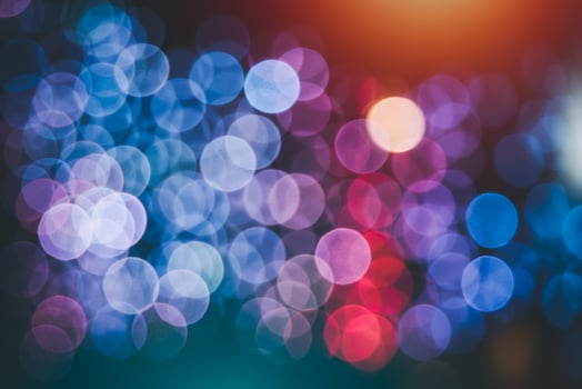 Abstract magical bokeh lights effect background, black, gold glitter for Christmas, for your banner, post. Glittering gold stars of bokeh use for celebrate background. photo
