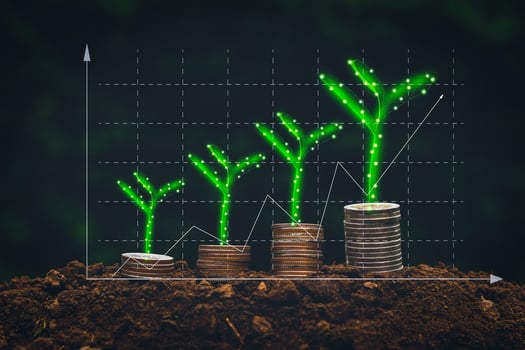 pile of coins with green digital bar chart Concept of future trend analysis of financial business to start saving or investing. photo