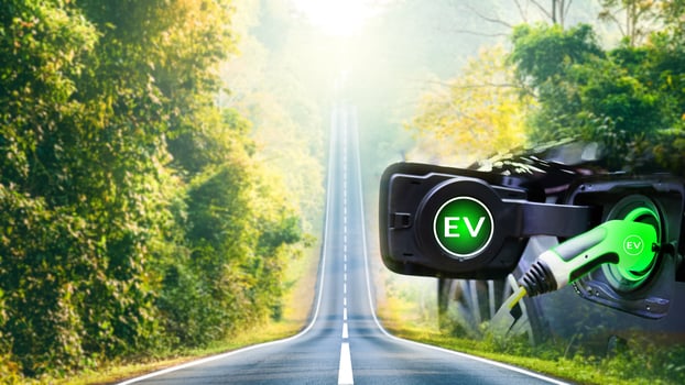 Charge EV electric car hybrid technology. Drive clean energy on nature travel with icon illustration EV electronic vehicle blur background future green eco car environment friendly power concept photo